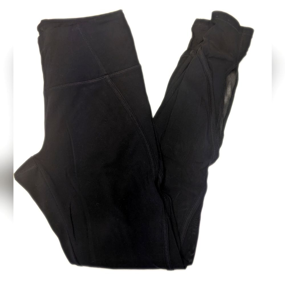 Athleta black leggings, sheer & cutout panels at ankles, no pockets, XS